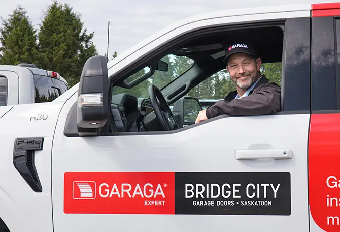 Garage door technician in Bridge City service truck